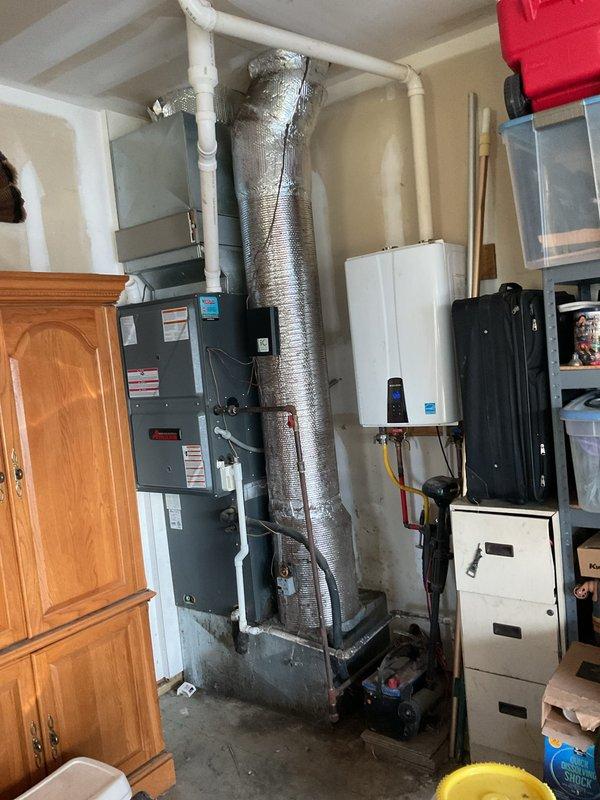 Completed comprehensive AC tune-up on 9-year-old residential air conditioning system currently operating within normal parameters. Performed standard preventive maintenance protocol including system inspection, replaced 20x25x5 air filter, verified refrigerant levels, checked electrical connections, and confirmed all components functioning properly with no deficiencies noted.