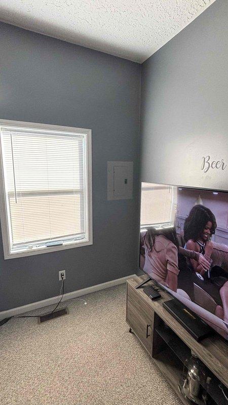 Installed 50-amp generator inlet with appropriate circuit protection at main electrical panel. Verified proper breaker sizing and panel capacity to safely accommodate emergency power transfer system for residential backup power application.