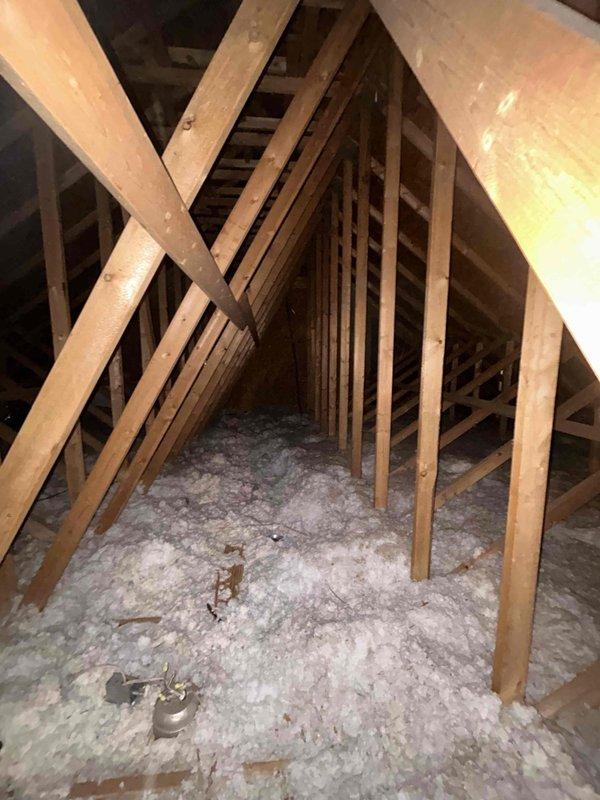 Conducted follow-up site visit to attic space for pending HVAC estimate. Documented existing conditions including exposed truss-style roof framing, OSB sheathing, and current blown-in insulation coverage between floor joists. Captured photographic evidence of attic access points, structural clearances, and insulation depth to finalize equipment placement recommendations and ductwork routing for proposed system installation.