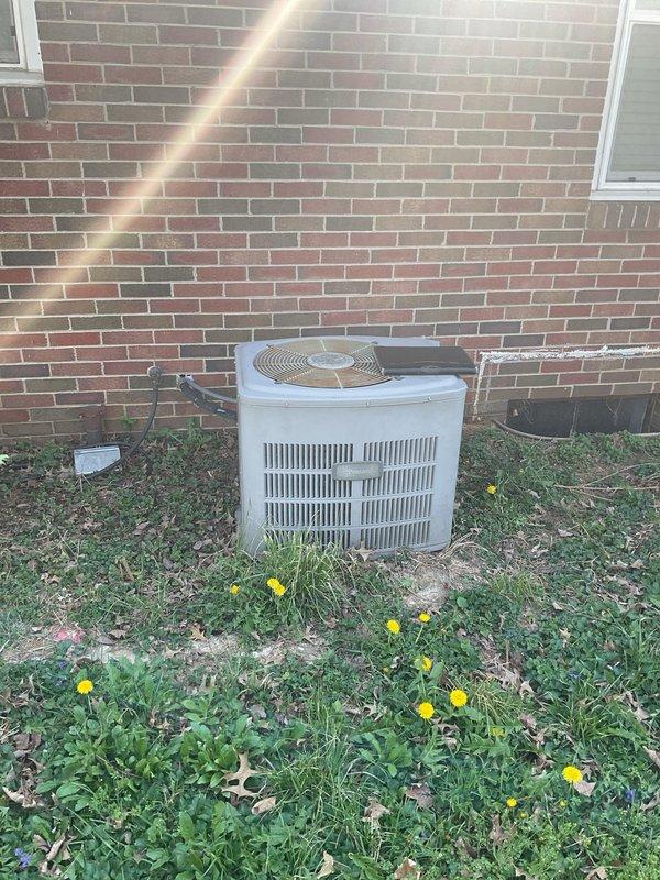 Completed comprehensive HVAC system evaluation for full replacement estimate at residential property. Assessed existing outdoor condensing unit positioned on concrete pad against brick exterior and inspected Nest thermostat with multi-stage wiring configuration including Y1, Y2, G, O/B, RC, W1, W2/AUX, C, and RH terminals. Documented current system condition and provided detailed replacement options with financing information based on previous recommendation from another contractor that complete system replacement was necessary.