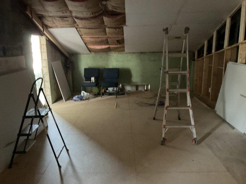 Completed comprehensive HVAC system replacement estimate for residential property with work areas located in unfinished attic space and interior room with block wall construction. Assessed existing conditions, documented installation requirements including structural considerations for equipment placement, evaluated ductwork routing through exposed ceiling joists and framing, and provided recommendations for complete system replacement to improve energy efficiency and comfort levels throughout the home.