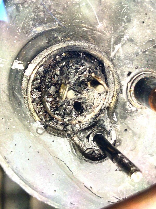 Responded to service call for second opinion on 6-year-old system blowing warm air with previous diagnosis of failed compressor. Upon inspection, discovered extensive mold and biological contamination on air handler cabinet and internal components, including evaporator coil assembly. Contamination indicated prolonged moisture exposure and inadequate drainage. Assessed compressor operation and refrigerant system functionality. Documented severe equipment deterioration with photographic evidence showing heavy mold growth on cabinet surfaces, wiring, and refrigeration lines. Provided homeowner with accurate diagnosis and recommended remediation options for contaminated equipment beyond initial compressor concern.