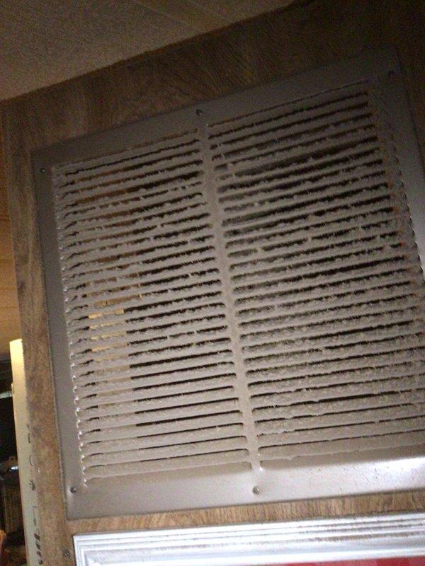 Completed Platinum Level monthly maintenance on residential Lennox air conditioning system. Performed comprehensive inspection of outdoor condensing unit, verified electrical connections at disconnect box, and assessed overall system operation. Inspected condenser coil condition, refrigerant lines, and mounting stability.

Interior inspection revealed heavily soiled return air grille with significant dust and debris accumulation throughout the slats, indicating extended period without cleaning. Addressed air quality concerns by servicing the filtration system. Replaced 20x20x5 media filter per maintenance agreement specifications to restore proper airflow and improve indoor air quality. 

Verified system operational parameters, checked thermostat function, and confirmed proper cycling. Documented equipment condition with photographic records for maintenance history. All work performed in accordance with Platinum Level service agreement requirements. System returned to normal operation 