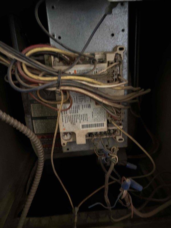 Responded to no-heat call on 30-year-old furnace unit. Upon arrival, accessed control compartment and performed visual inspection of internal components, wiring connections, and control board assembly. Documented existing conditions of electrical connections, wire routing, and control module configuration with photographs for service records. Advised property owner that diagnostic findings unrelated to previous service work would be subject to standard service charges per callback policy.