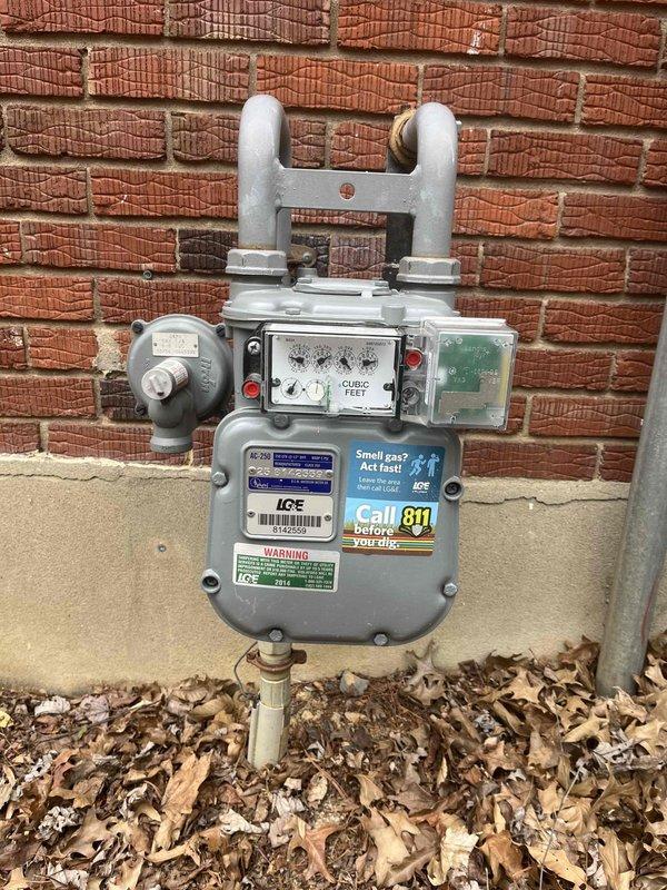 Conducted comprehensive replacement estimate for residential HVAC system. Existing Rheem outdoor condensing unit failed and no longer providing cooling, forcing occupants to rely on temporary window air conditioning units. Assessed current equipment installation, natural gas meter configuration, and site conditions to develop complete system replacement specifications for new heating and cooling equipment.