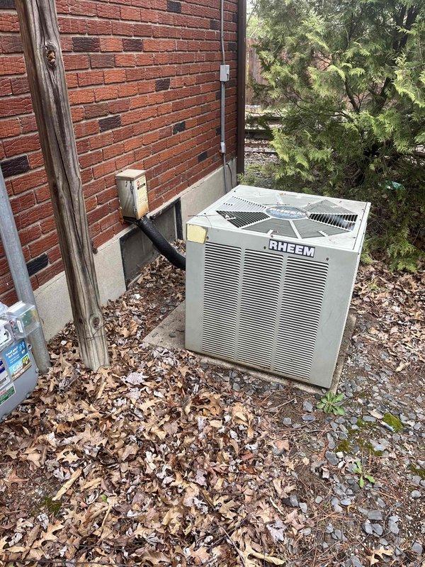Conducted comprehensive replacement estimate for residential HVAC system. Existing Rheem outdoor condensing unit failed and no longer providing cooling, forcing occupants to rely on temporary window air conditioning units. Assessed current equipment installation, natural gas meter configuration, and site conditions to develop complete system replacement specifications for new heating and cooling equipment.