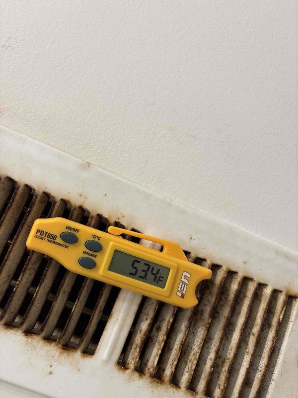 Responded to no-cooling complaint for upstairs HVAC system in dual-zone residence with 7-year-old equipment. Performed diagnostic evaluation and temperature differential testing at supply registers, measuring 53.8°F discharge air temperature. Pulled new thermostat wire to restore proper communication between control system and air handler. Verified airflow at vents and confirmed downstairs system operating normally while upstairs zone experienced elevated temperatures reaching 80°F. System restored to proper operation with adequate cooling capacity confirmed at supply registers.