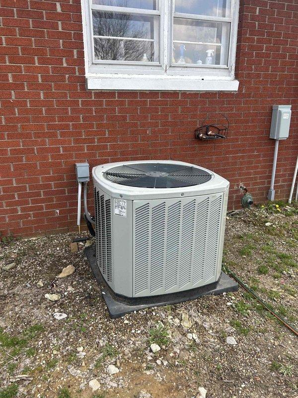 # HVAC Service Call - No Cooling Issue

Responded to service request for 15-year-old residential air conditioning system experiencing cooling problems. Upon arrival, performed comprehensive system evaluation of indoor Trane furnace/air handler unit and outdoor condensing unit.

## Work Performed

Conducted visual inspection of indoor air handler located in utility closet, checking electrical connections, condensate drainage system, and ductwork integrity. Verified proper airflow through supply and return ducts. Inspected PVC condensate drain lines for blockages or restrictions.

Performed outdoor unit assessment, examining condenser coil condition, fan motor operation, and refrigerant line connections. Tested electrical disconnect and verified proper voltage supply to unit. Evaluated compressor operation and measured system pressures.

Given the age of the system at 15 years, thoroughly checked for common failure points including capacitor degradation, contactor wear, and refrigerant l