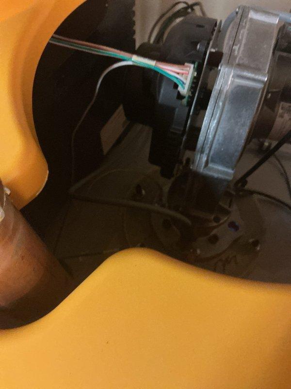 Responded to service call for A.O. Smith Cyclone MXi modulating water heater experiencing ignition failure and flame retention issues. Upon inspection, diagnosed faulty blower motor assembly preventing proper combustion air flow, which triggered lighting error codes and prevented unit from maintaining flame. Replaced defective blower motor, tested ignition sequence, verified proper flame operation, and confirmed unit returned to normal heating cycle with tank temperature rising appropriately to setpoint of 120°F.