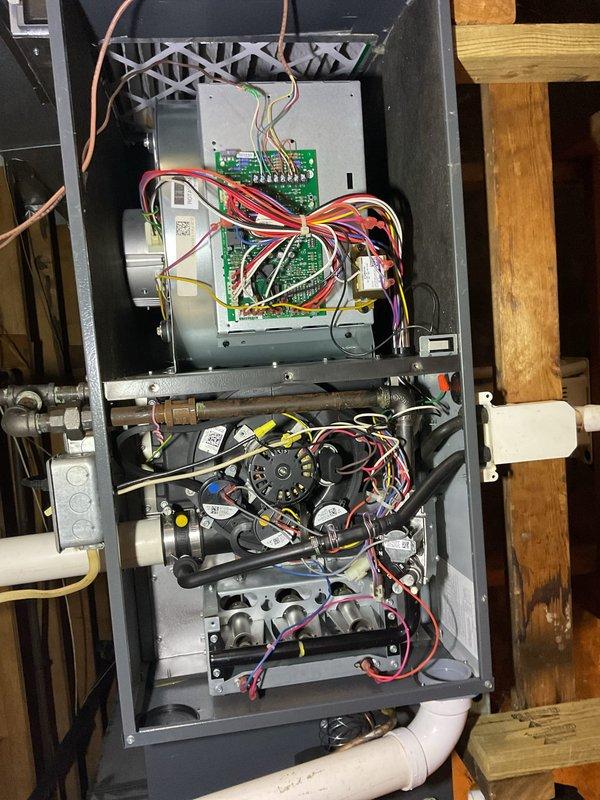 Completed comprehensive spring AC tune-up and cleaning for maintenance plan member on air handler system installed in 2021. Performed full inspection of internal components including blower motor assembly, electrical connections, circuit boards, and refrigerant lines; verified all wiring bundles secure and properly connected; checked condensate drain lines and PVC piping for proper operation. System tested and confirmed operating within normal parameters with no issues found.