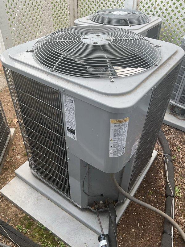 # HVAC Service Completed

Responded to no cooling complaint on residential split system over 10 years old. Upon arrival, performed diagnostic evaluation of outdoor condensing unit and indoor air handler system. Completed repairs per approved estimate to restore cooling operation.

Serviced dual outdoor condenser units located on exterior concrete pads. Addressed cooling system failure through systematic troubleshooting of refrigeration circuit, electrical components, and mechanical systems. Inspected Carrier furnace and associated air handler equipment in basement utility area. Verified proper operation of all HVAC controls and safety devices.

Completed necessary repairs to condensing unit including component replacement as specified in estimate. Tested system performance following repairs. Confirmed adequate airflow through evaporator coil and proper refrigerant pressures. Verified electrical connections secure at both outdoor and indoor equipment. System restored to normal cooling o