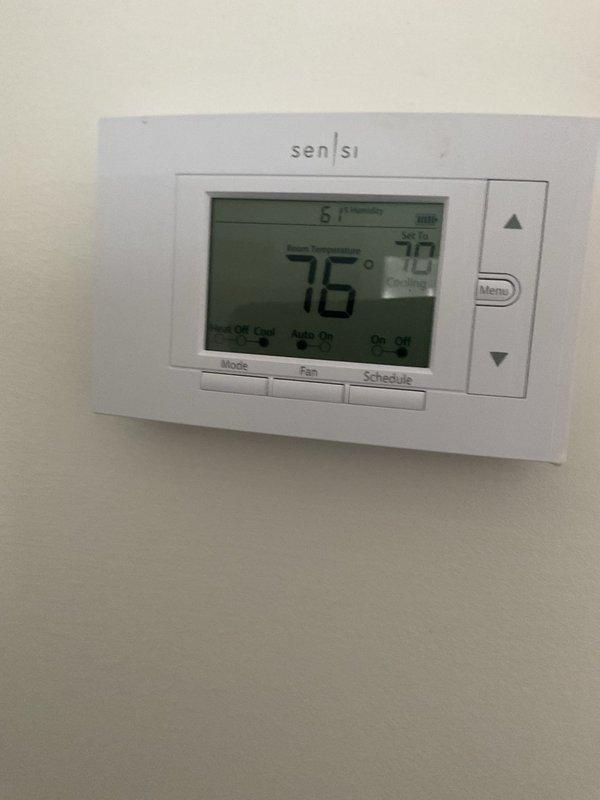 Responded to no cooling complaint on 15-year-old residential air conditioning system. Upon inspection, diagnosed failed dual-run capacitor preventing compressor and condenser fan operation. Replaced defective capacitor with new unit, restoring full system functionality. Verified proper operation at thermostat showing 76°F display, confirmed cooling cycle initiation, and tested both compressor and outdoor fan motor performance. System returned to normal cooling operation.
