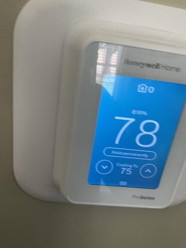 Completed follow-up maintenance visit to verify system performance after previous service call. Performed diagnostic testing on HVAC unit, including capacitor testing with multimeter to confirm proper electrical function and system charging levels. Verified thermostat operation showing system actively cooling from 78°F to setpoint of 75°F. Confirmed unit running properly with all components functioning as designed.