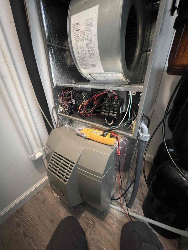 Completed maintenance callback to diagnose system malfunction and identified failed control board requiring replacement. Performed electrical diagnostics using multimeter to test circuit breaker connections and verify voltage readings at air handler control panel. Documented equipment model and serial number information, captured photos of defective control board and system configuration for part ordering purposes, with estimated 90-minute installation time upon part arrival.