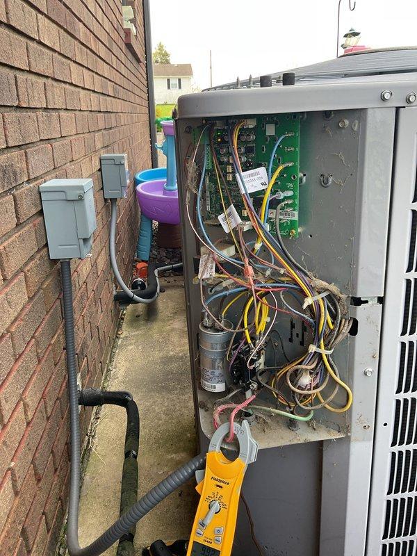 Responded to service call for Carrier Infinity system displaying fault codes and shutting down completely. Upon arrival, found thermostat reporting multiple A/C faults including high pressure switch open (117 events), brownout on 230V (69 events), and no 230V to unit (2 events). Inspected outdoor unit's electrical panel and internal components including control board, wiring connections, and capacitor. Diagnosed electrical supply issues and high pressure switch failures causing system lockouts. Utilized diagnostic equipment to test voltage levels and verify proper power delivery to unit. Addressed underlying electrical concerns and high pressure switch malfunction. Cleared fault codes from Infinity thermostat system. Tested system operation to ensure proper cooling function restored and verified unit running without further error codes or shutdowns.