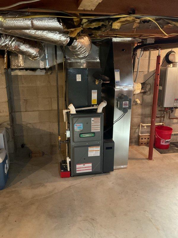 Completed comprehensive planned maintenance on dual HVAC system including outdoor condensing unit and indoor air handler/furnace system. Performed full system inspection, cleaned components, checked refrigerant levels, tested electrical connections, verified proper airflow, and confirmed both units operating within manufacturer specifications. All maintenance tasks completed per preventive maintenance program requirements with no issues identified and both systems functioning efficiently.