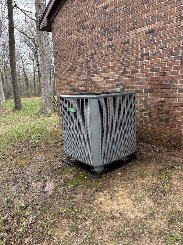 Completed Gold Level planned maintenance on 8-year-old residential HVAC system. Performed comprehensive inspection of outdoor condensing unit and indoor air handler components. Verified system operation and measured supply air temperature at 57°F, confirming proper cooling performance. Documented equipment condition through photographic records showing outdoor unit in good operational condition with no visible damage or excessive wear. Checked Aprilaire 2200 filter housing and confirmed proper installation. System operating within normal parameters with one maintenance visit remaining on service agreement.