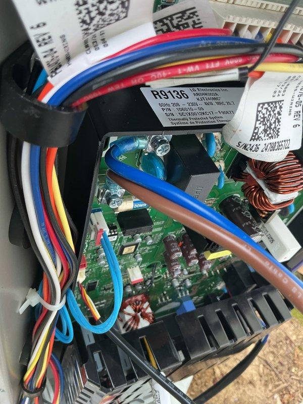 Responded to warranty follow-up call for heat pump system less than one year old displaying "OU Inverter" error code and inadequate heating performance with thermostat set at 72°F. Diagnosed faulty inverter board on outdoor unit through visual inspection and electrical testing, confirmed system operating in heating mode but with compromised efficiency. Documented inverter board model number, captured detailed photographs of circuit board assembly showing toroidal inductors, integrated circuits, and component layout, and recorded amperage readings of 8.5A during diagnostic testing. Ordered replacement inverter board under warranty coverage with red priority status due to reduced heating capacity, estimated two-hour installation time upon part arrival, no additional helper required for completion.