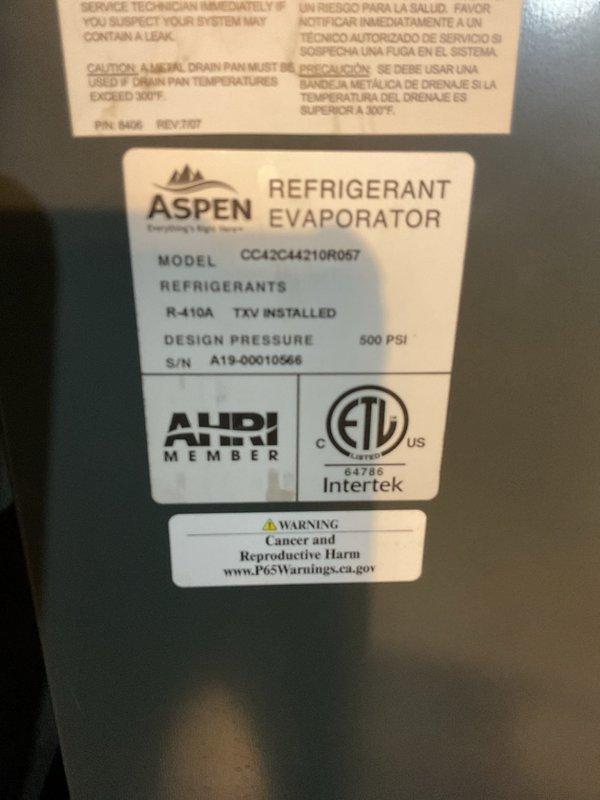 Completed annual second visit platinum level maintenance on 6-year-old residential HVAC system with Aspen R-410A evaporator coil and furnace assembly. Performed comprehensive inspection of all system components, verified proper operation of TXV-equipped evaporator unit, and documented equipment condition with photographic records. Replaced 20x20x5 air filter and confirmed all safety labels and manufacturer specifications remain legible and intact for future service reference.