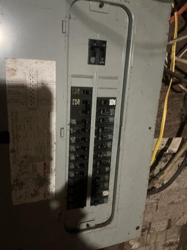 Responded to service call for 21-year-old HVAC system experiencing thermostat failure. Upon arrival, confirmed air handler was operational and circulating air through ductwork, but system was not reaching set temperature due to hardwired thermostat displaying blank screen with no power. Performed diagnostic evaluation of electrical system, inspecting breaker panel to verify power supply to HVAC equipment and thermostat circuit. Identified loss of power to thermostat control circuit while main system continued to operate. Traced wiring from air handler located in basement through insulated ductwork to thermostat location. Verified breaker positions and electrical connections at panel. Diagnosed thermostat power supply issue preventing temperature control and system communication. Restored proper thermostat functionality, allowing system to resume normal heating/cooling cycles and reach desired temperature settings.