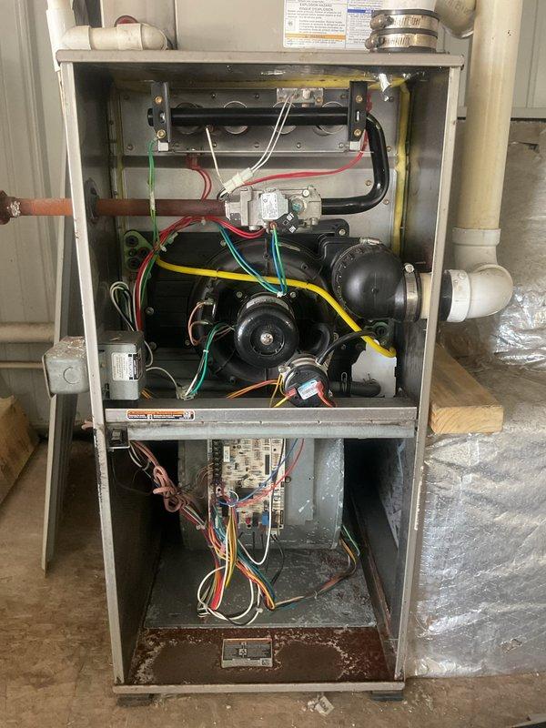 Completed second annual Gold Level planned maintenance visit on 8-year-old single system HVAC installation. Performed comprehensive inspection of indoor gas furnace unit and outdoor air conditioning condenser. Inspected all internal furnace components including blower motor assembly, gas valve, draft inducer motor, electrical control board, and wiring connections. Verified proper operation of all mechanical and electrical systems within the furnace cabinet. Examined outdoor condenser unit including fan assembly, compressor operation, and refrigerant line sets. Checked electrical connections, disconnect boxes, and associated conduit. Documented equipment condition through photographic records showing internal furnace components and external condenser installation. System operating within normal parameters. Customer utilizing 16x25x1 filter size. All routine maintenance tasks completed per Gold Level service agreement specifications.
