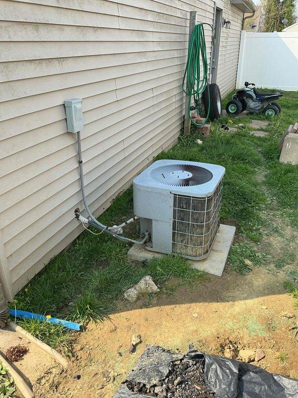 Responded to no cooling complaint on residential split system over 10 years old with airflow present but no temperature drop. Upon inspection, found outdoor condenser unit operational and evaporator coil with significant corrosion and deterioration to cabinet and components. Diagnosed system failure due to age-related component degradation and recommended full system replacement given the advanced deterioration of equipment and age of unit exceeding typical service life.