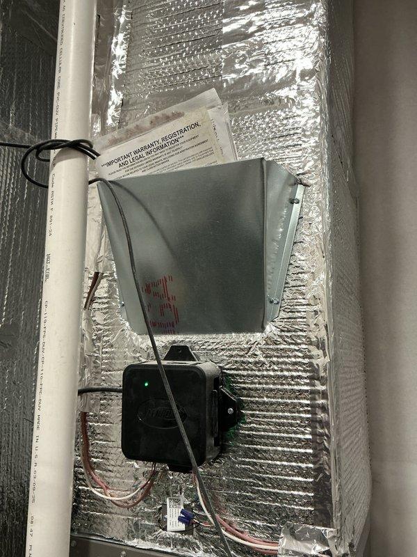 # HVAC Maintenance Summary

Completed platinum-level preventive maintenance on single-system residential HVAC installation. Inspected air handler unit with MERV 16 Carbon Clean air filter (16" x 26" x 5", model Y6605) and verified proper operation of control module with green indicator light showing active status. Examined electrical junction box connections, PVC condensate drain lines with functioning valves, and flexible aluminum ductwork installation over reflective insulation. All system components operating within normal parameters, documentation updated, and photographic records captured for service history.