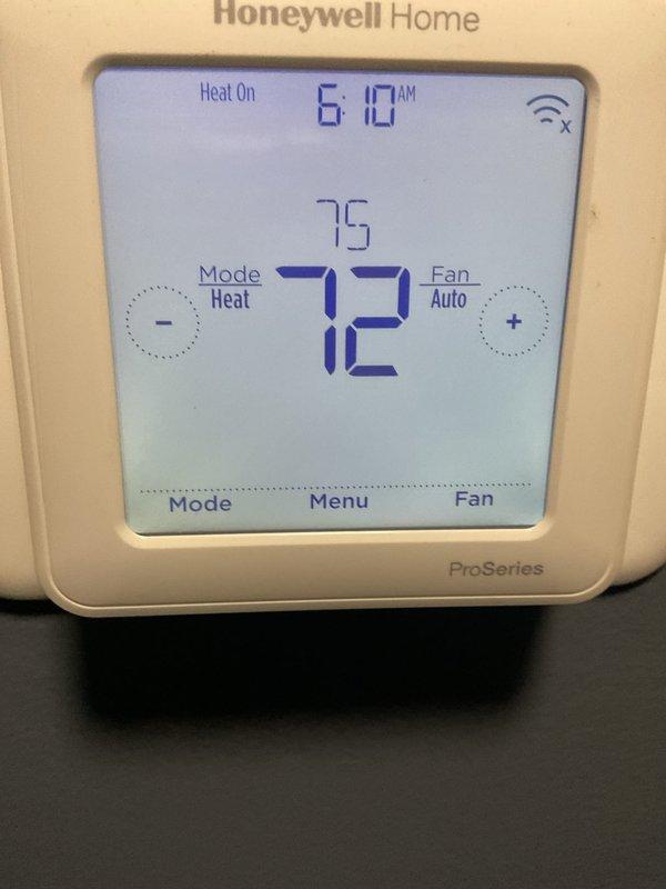 Responded to callback for HVAC system experiencing intermittent heating and cooling failure requiring breaker reset to restore operation. Upon arrival, evaluated Honeywell ProSeries thermostat displaying proper heat mode operation at 72°F setpoint and inspected outdoor condenser unit for potential electrical or mechanical issues. Documented system configuration and current operating conditions to diagnose underlying cause of power interruption and improper system performance reported by homeowner.