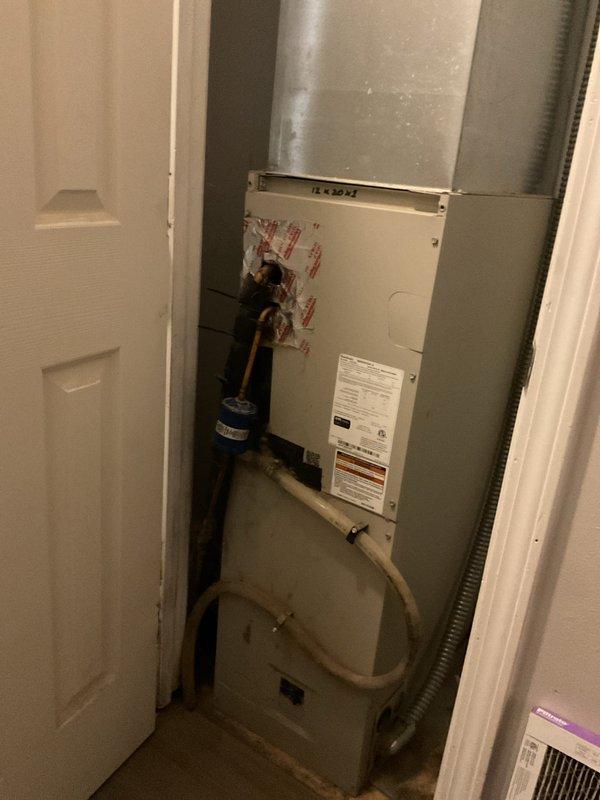 Conducted comprehensive replacement estimate for failed HVAC system with refrigerant leak and non-functional heat pump. Evaluated existing air handler installation in interior utility closet, documented equipment configuration including copper refrigerant lines, condensate drainage system, and ductwork connections. Assessed space constraints and existing infrastructure to provide complete system replacement recommendations, as customer declined repair options in favor of full equipment replacement.