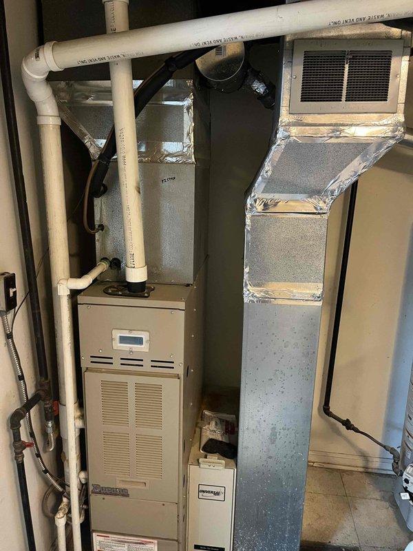 Responded to no cooling call with no airflow from vents and system not attempting to start. Upon arrival, performed complete system diagnostic on residential split HVAC system. Discovered failed blower motor in air handler unit preventing indoor fan operation and airflow distribution. Additionally identified defective run capacitor on outdoor condensing unit preventing compressor from starting. Replaced blower motor assembly in air handler with OEM equivalent motor, ensuring proper amperage and CFM specifications. Installed new dual-run capacitor on condensing unit with correct microfarad ratings for both compressor and condenser fan motor. Verified all electrical connections, tested voltage and amperage readings at both units to confirm proper operation. Cycled system through multiple cooling cycles, confirmed adequate airflow at supply registers, and verified temperature split across evaporator coil within manufacturer specifications. System restored to full operational status with p