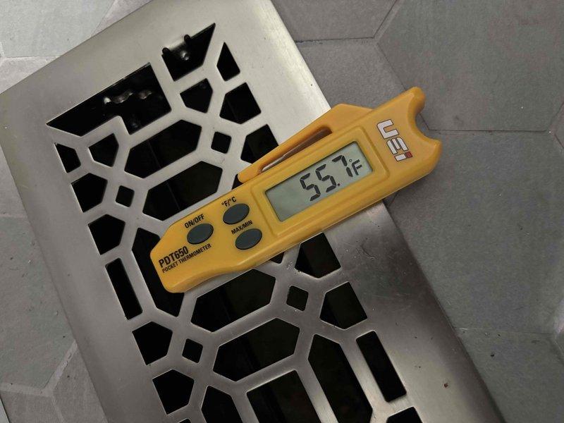 Responded to no cooling complaint on 10+ year old system for second opinion evaluation. Previous contractor diagnosed failed compressor. Upon arrival, measured supply air temperature at register showing 53.1°F, indicating system is producing cooled air. Inspected outdoor condensing unit and verified compressor operation, refrigerant lines, and overall system functionality. System found operating within normal parameters with no evidence of compressor failure at time of inspection.