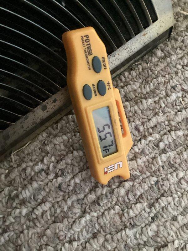 Responded to no-cool service call on 20+ year old residential air conditioning system. Customer reported unit running continuously without shutting off after reaching target temperature setpoint. Upon arrival, confirmed adequate airflow at supply registers with no visible ice formation on indoor coil or furnace area. Measured supply air temperature at 53°F using calibrated digital thermometer, indicating system producing cooling but experiencing control issues.

Inspected outdoor condenser unit and found equipment operational but showing age-related wear. Condenser coil exhibited moderate dirt accumulation and debris on exterior surfaces. Performed diagnostic evaluation of thermostat control circuit and cycling operation. System demonstrated continuous run condition consistent with thermostat malfunction or improper temperature differential settings preventing proper cycling.

Identified failed or malfunctioning thermostat as root cause preventing system from satisfying call for coolin