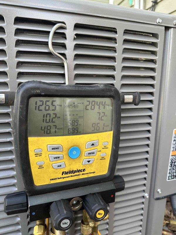 Completed full HVAC system installation of a 2.5-ton, 14 SEER air conditioner with 97% AFUE furnace as an upsell from service call. System was properly commissioned with refrigerant pressures verified using digital manifold gauges, temperature splits confirmed within manufacturer specifications, and all operational parameters tested to ensure optimal performance.