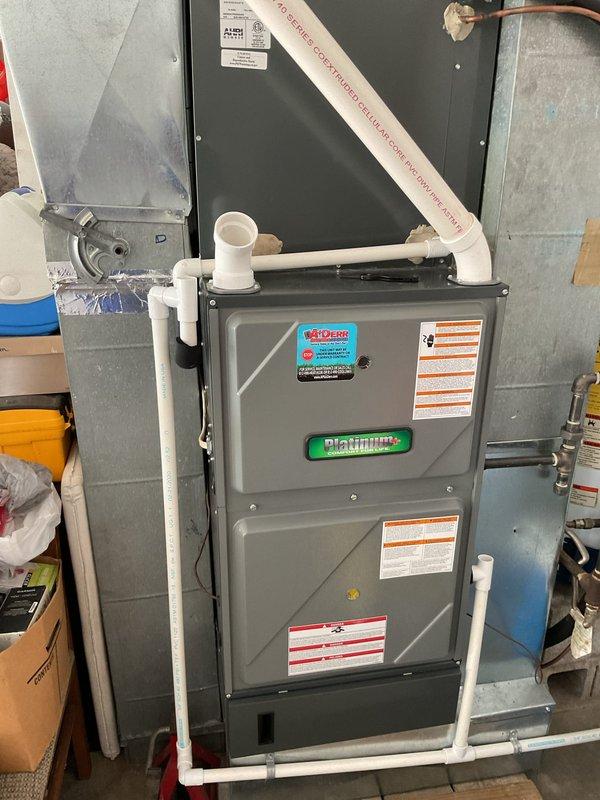 Completed annual Platinum Level maintenance on a 6-year-old residential HVAC system during the first visit of the maintenance cycle. Performed comprehensive inspection of the furnace unit, including examination of all safety labels, manufacturer specifications, and operational components. Replaced the 20x25x5 air filter with a new pleated filter to ensure optimal airflow and system efficiency. Inspected PVC condensate drainage lines, ductwork connections, and verified proper installation of all ventilation components. All system components were found to be in good working condition with no immediate repairs required. Photographic documentation was captured for service records.