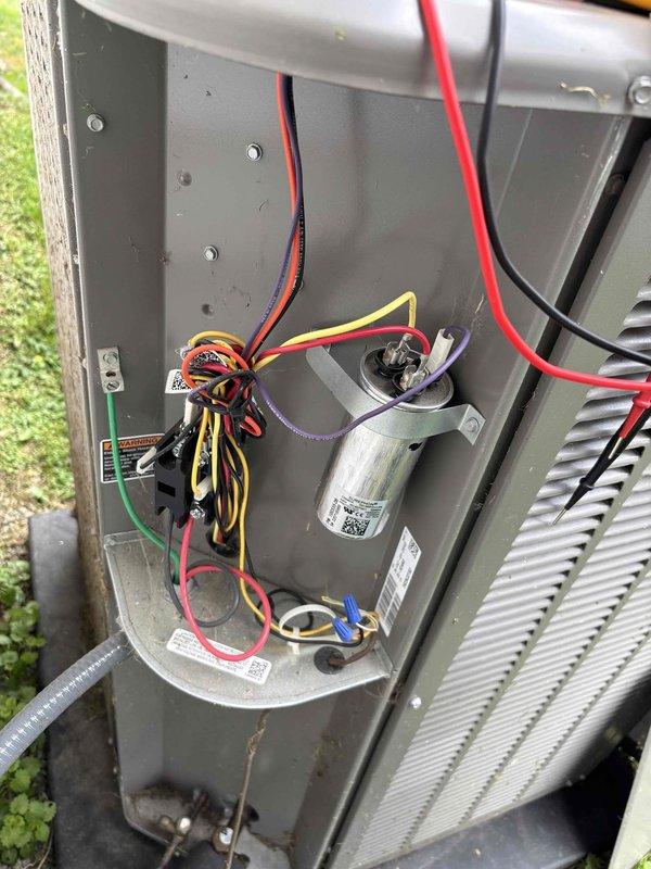 Completed Platinum Level planned maintenance on a single HVAC system with one year of service. Performed comprehensive system inspection including electrical diagnostics using clamp meter, which confirmed proper amperage draw at 85.1 amps, indicating normal compressor operation. Accessed outdoor condensing unit, inspected all electrical connections, capacitor, and wiring harness for proper terminations and signs of wear. Verified condenser coil fins are clean and intact with no visible damage or deterioration. Replaced 16x20x4 air filter as part of routine maintenance protocol. All components operating within manufacturer specifications with no deficiencies noted.