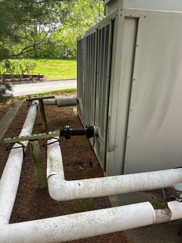 Completed comprehensive replacement estimate for dual HVAC system installation at residential property. Evaluated existing outdoor condensing units, electrical disconnect panel configuration with four breakers, and associated refrigerant line routing. Documented current system conditions, electrical infrastructure capacity, and equipment placement locations to provide homeowner with equipment options and installation specifications for replacing both operational heating and cooling systems.