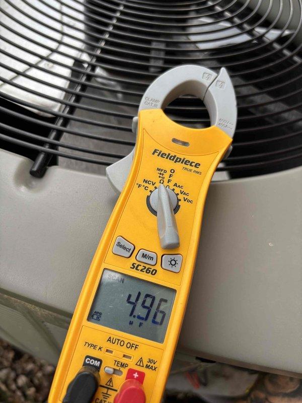 Completed comprehensive Platinum Level planned maintenance on single HVAC system during first-year service visit. Performed thorough inspection of outdoor condenser unit and indoor air handler components, verifying proper operation of all mechanical and electrical systems. Measured amperage draw at 496 amps using calibrated clamp meter to confirm compressor performance within manufacturer specifications. Inspected condenser fan motor operation, refrigerant line connections, and electrical disconnect box for proper function and safety compliance. Verified airflow through condenser coils and checked unit mounting stability on exterior pad. Documented equipment condition with detailed photographs showing both indoor blower assembly and outdoor condensing unit. System operating efficiently with no deficiencies noted at time of service.