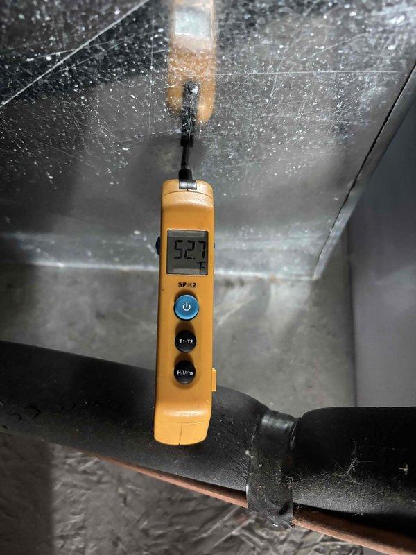 Completed Platinum Level planned maintenance on a 1-year-old HVAC system during the second annual visit. Performed comprehensive system inspection including outdoor condensing unit evaluation with access panel removal to assess electrical components, capacitor, contactors, and wiring connections. Replaced 20x20x5 air filter and recorded temperature measurements within the duct system, which registered 52.1°F indicating proper cooling operation. All electrical components, connections, and hardware showed normal wear consistent with system age and outdoor installation. System is operating within manufacturer specifications and customer is due for service plan renewal.