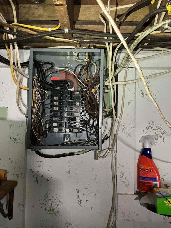 Responded to service call for partial power loss affecting portions of the residence. Upon arrival, performed comprehensive troubleshooting of the main electrical distribution panel and associated branch circuits. Inspected panel box, circuit breakers, and wire connections for signs of failure, loose connections, or damaged components. Traced affected circuits through basement and attic spaces to identify point of failure. Verified proper voltage levels, tested breaker functionality, and examined wire routing through floor joists and structural spaces. Identified and resolved issue causing partial power condition, restoring full electrical service to all affected areas of the home.