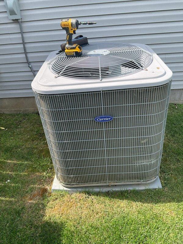 Responded to no cooling call on Carrier air conditioning system less than 10 years old with indoor temperature at 78°F. System had airflow but no cooling output, no tripped breakers, and no ice buildup at indoor coil. Upon arrival, performed visual inspection of outdoor condenser unit and found significant dirt and debris accumulation on condenser coil fins, restricting airflow and reducing heat transfer efficiency. Cleaned condenser coil thoroughly to restore proper airflow and system capacity. Verified system operation, confirmed adequate cooling, and restored comfort to residence.