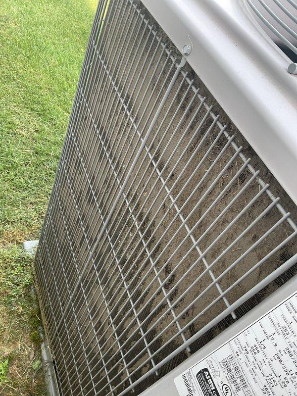 Responded to no cooling call on Carrier air conditioning system less than 10 years old with indoor temperature at 78°F. System had airflow but no cooling output, no tripped breakers, and no ice buildup at indoor coil. Upon arrival, performed visual inspection of outdoor condenser unit and found significant dirt and debris accumulation on condenser coil fins, restricting airflow and reducing heat transfer efficiency. Cleaned condenser coil thoroughly to restore proper airflow and system capacity. Verified system operation, confirmed adequate cooling, and restored comfort to residence.