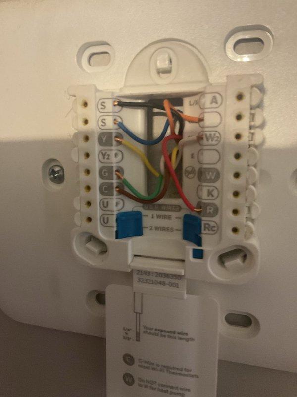 Completed comprehensive replacement estimate for non-operational residential HVAC system requiring both heating and cooling equipment replacement. Assessed existing outdoor condensing unit with protective fencing and evaluated current thermostat wiring configuration including multi-wire connections at terminal points. Documented equipment specifications, reviewed installation requirements, and provided homeowner with complete system replacement options for both air conditioning and heating components.