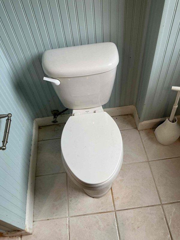 Responded to service call for continuously running toilet and slow-draining shower and sink. Upon arrival, inspected toilet tank components and identified faulty fill valve causing constant water flow. Assessed bathtub drain assembly and confirmed partial blockage consistent with hair accumulation affecting both shower and sink drainage due to shared plumbing line. Removed tub spout access cover to evaluate drain system and prepared recommendations for drain cleaning service to restore proper water flow throughout bathroom fixtures.