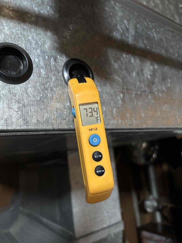 Completed annual Gold Level maintenance on 11-year-old HVAC system. Performed comprehensive inspection of outdoor unit including electrical components, capacitor, and contactor assembly. Verified system operation with temperature readings showing 73.4°F. All electrical connections secure with proper wire routing and orange wire nuts intact. Capacitor and relay components inspected and functioning within normal parameters. System operating efficiently with no issues found during maintenance visit.