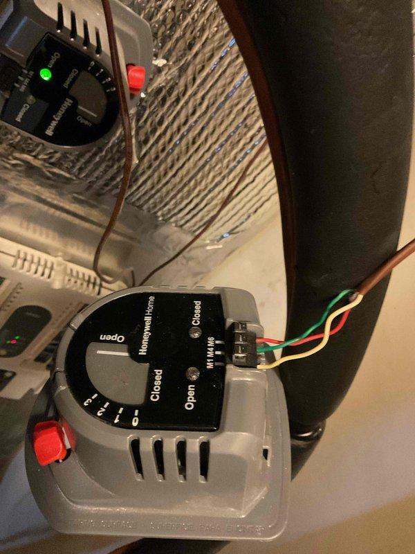 Responded to no cooling complaint on 15-year-old zoned HVAC system with upstairs zone not cooling efficiently. Diagnosed failed dual-run capacitor on upstairs zone air handler. Replaced defective TITAN TRCFD455 capacitor (440/370V) and verified proper electrical connections to compressor and fan motor terminals. Tested zone damper actuators for proper operation and confirmed both zones cycling correctly. System restored to full cooling capacity with all zones functioning normally.