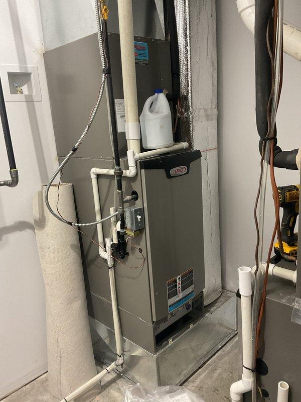 Completed annual Platinum Level planned maintenance on dual HVAC system installation. Performed comprehensive inspection and servicing of both units, including Lennox furnace and air handler components. Replaced 25x25x5 and 16x25x5 filters, inspected condensate pump operation, verified proper drainage through PVC condensate lines, and checked refrigerant line insulation integrity. Examined all electrical connections, tested safety controls, and confirmed proper airflow through metallic ductwork. Verified water heater and mechanical room components for clearance and safety compliance. All systems operating within manufacturer specifications upon completion of first annual maintenance visit.