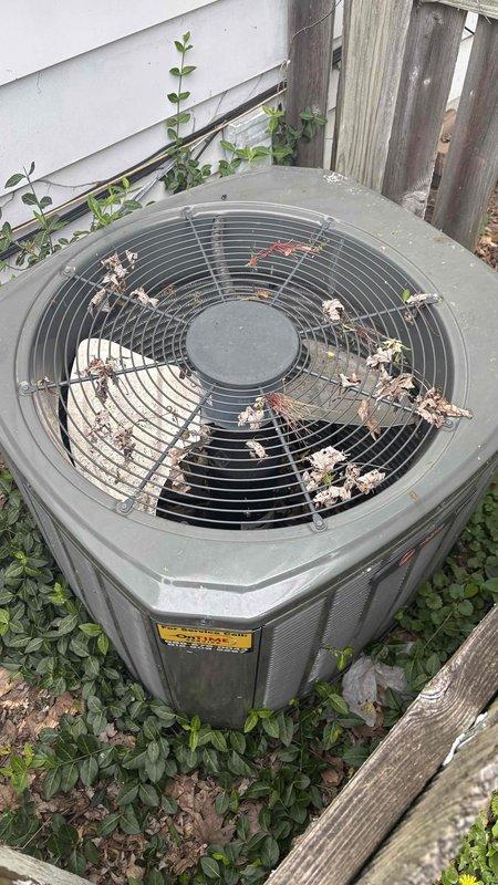 Conducted comprehensive site evaluation for complete HVAC system and ductwork replacement estimate. Assessed existing outdoor condenser unit showing significant age-related deterioration, accumulated debris on fan grille, and vegetation encroachment around base requiring clearance. Evaluated interior ductwork infrastructure and identified corroded metal components with heavy rust and oxidation affecting system efficiency. Documented current system conditions through photographic evidence to support replacement recommendations. Prepared detailed estimate options including full AC system and ductwork replacement as well as alternative ductwork-only replacement scenario per customer request.