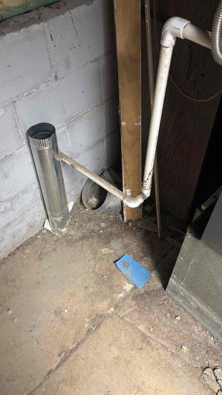 Completed comprehensive HVAC system replacement estimate for municipal contractor requiring outdoor condensing unit replacement. Verified existing Carrier furnace system non-operational with customer declining repair option in favor of full outdoor unit replacement. Documented existing basement installation including furnace configuration, venting system, PVC condensate drainage, and current mechanical room layout through photographic documentation to facilitate accurate equipment specifications and installation planning for municipal approval process.