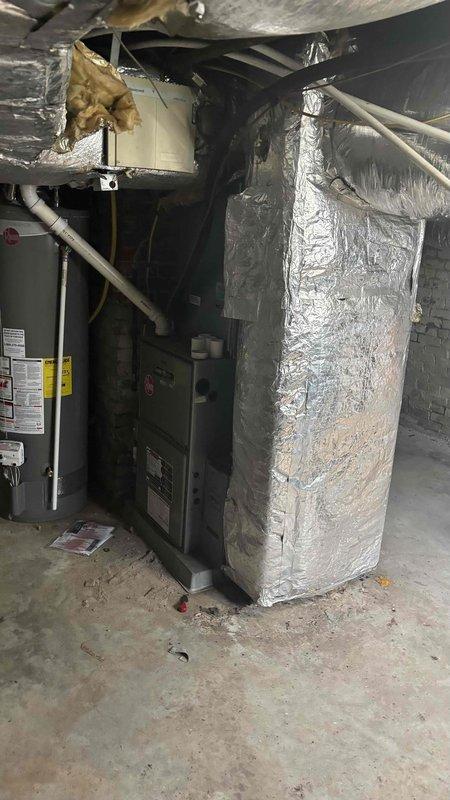 Completed comprehensive HVAC estimate for air conditioning system replacement due to non-operational 10-year-old unit that would not power on. Assessed existing basement installation, documented current furnace configuration with connected ductwork and plenum system, and captured detailed measurements and spatial requirements for new AC unit installation. The existing heating furnace was confirmed operational and requires no service at this time.