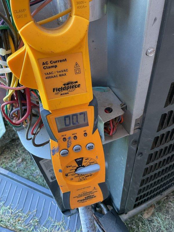 Completed annual platinum-level preventive maintenance on single HVAC system. Verified thermostat operation showing 68°F set point with cooling mode active to 63°F and 52% humidity level. Measured system amperage at 0.07A using clamp meter on outdoor unit, confirming proper electrical operation. Replaced both air filters per specifications (14x14x1 and 14x30x1). All components inspected and operating within normal parameters.